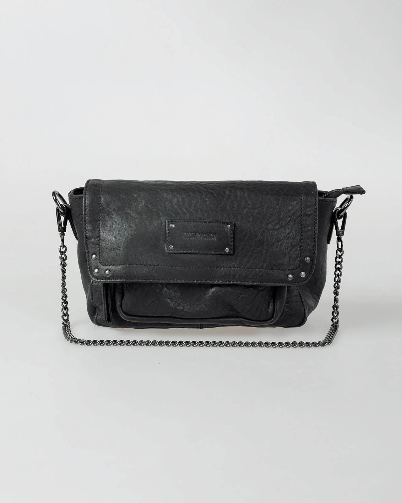 Bolso piel tachas